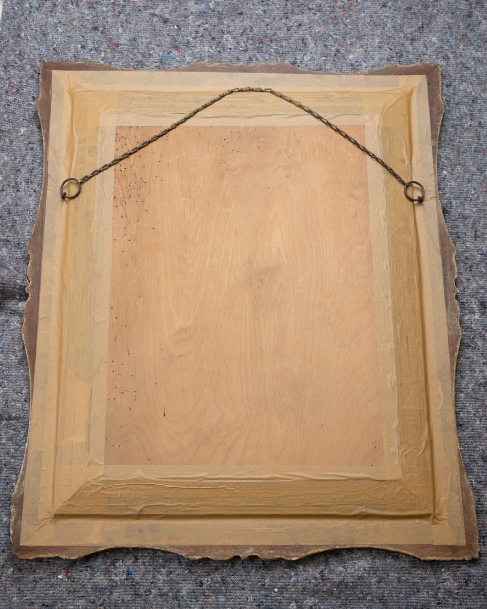 A rectangular dark oak wall mirror featuring a moulded timber frame with gilded gesso accents at the corners, outer edges, and inner sight edge. View XV