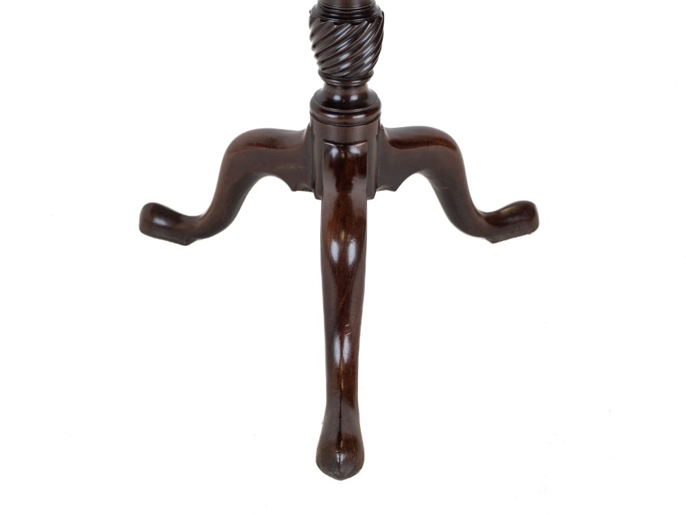 An 18th-century dark mahogany wine table with a round top, spiral-turned central column, and a tripod base with pad feet. View VIII