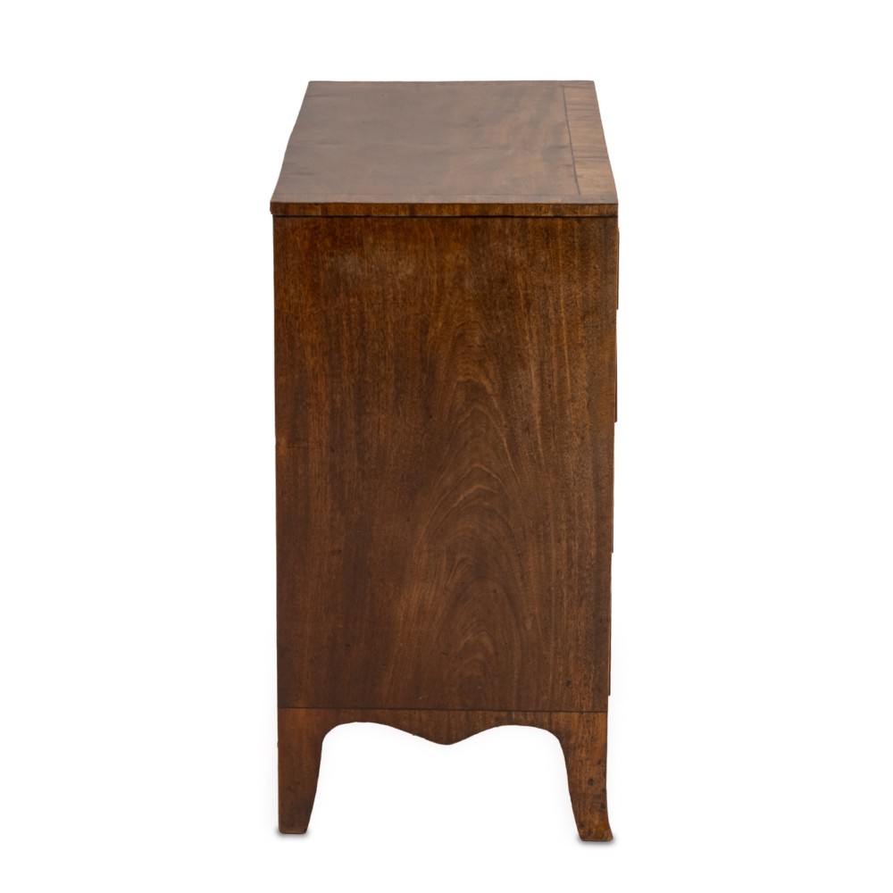 A late Georgian Regency mahogany chest of drawers featuring a caddy top, two short drawers over three long drawers, brass ring handles, and splayed bracket feet. View IX