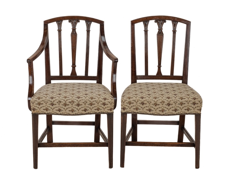 Set of six Georgian mahogany dining chairs in Sheraton style, including four side chairs and two open armchairs, with pattern upholstered seats. View X