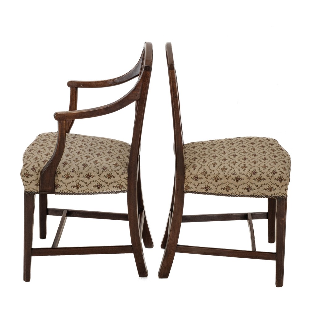 Set of six Georgian mahogany dining chairs in Sheraton style, including four side chairs and two open armchairs, with pattern upholstered seats. View XI