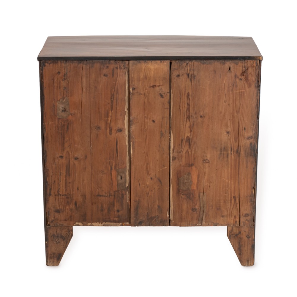 A Regency mahogany bow-front chest of drawers featuring four graduated drawers with circular brass ring handles and splayed bracket feet. View XI