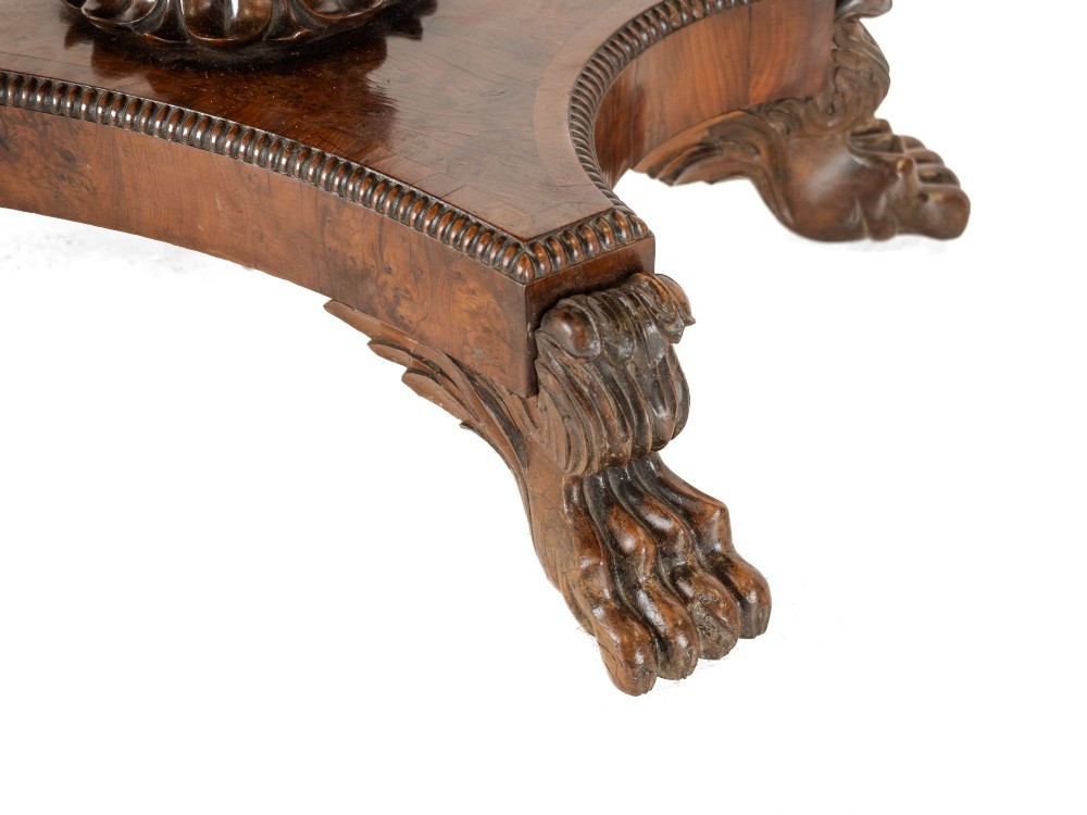 An antique William IV burr yew wood card table with a fold-over top, central carved pedestal column, and paw feet. View XII