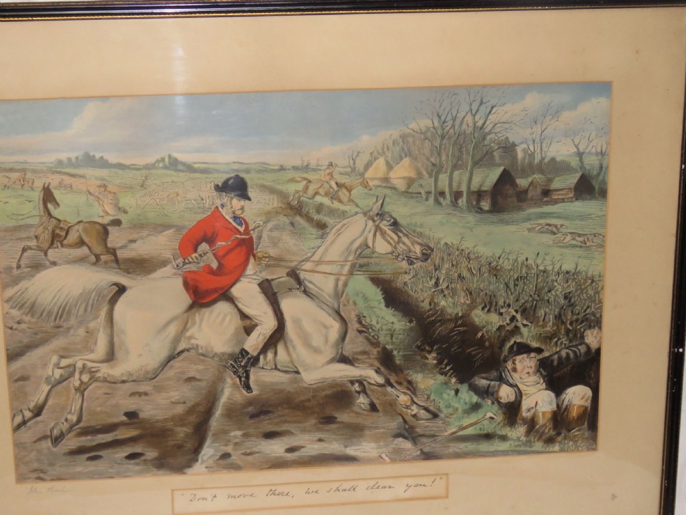 A framed Victorian sporting print depicting equestrian riders and foxhounds in a rural landscape with a windmill in the background, set within a cream mount and black wooden frame. View II