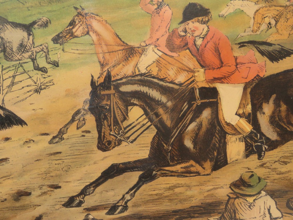 A framed Victorian sporting print depicting equestrian riders and foxhounds in a rural landscape with a windmill in the background, set within a cream mount and black wooden frame. View IV