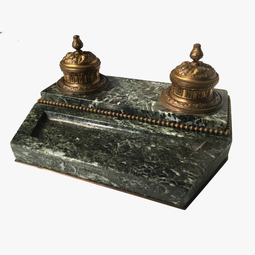 A three-piece antique French green marble desk set with gilt ormolu mounts, comprising a dual-inkwell stand, a rocker blotter, and a matching lidded box. View II