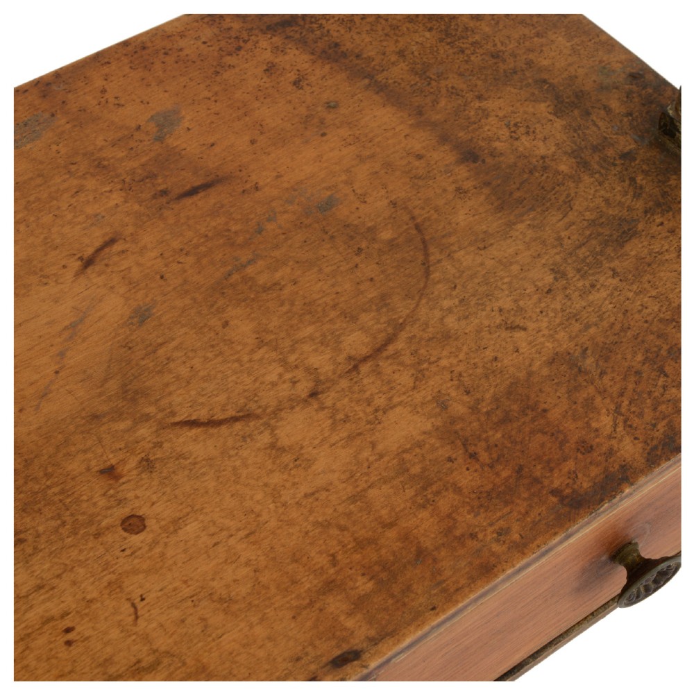 A Regency mahogany tabletop shelving unit with three graduated open tiers supported by turned spindles over a base with two drawers. View VIII
