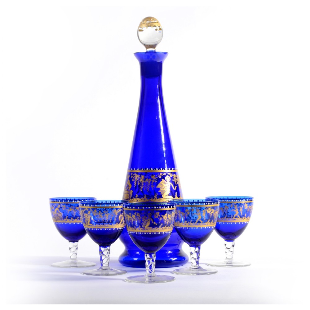 19th Century Venetian blue glass bottle and four glasses