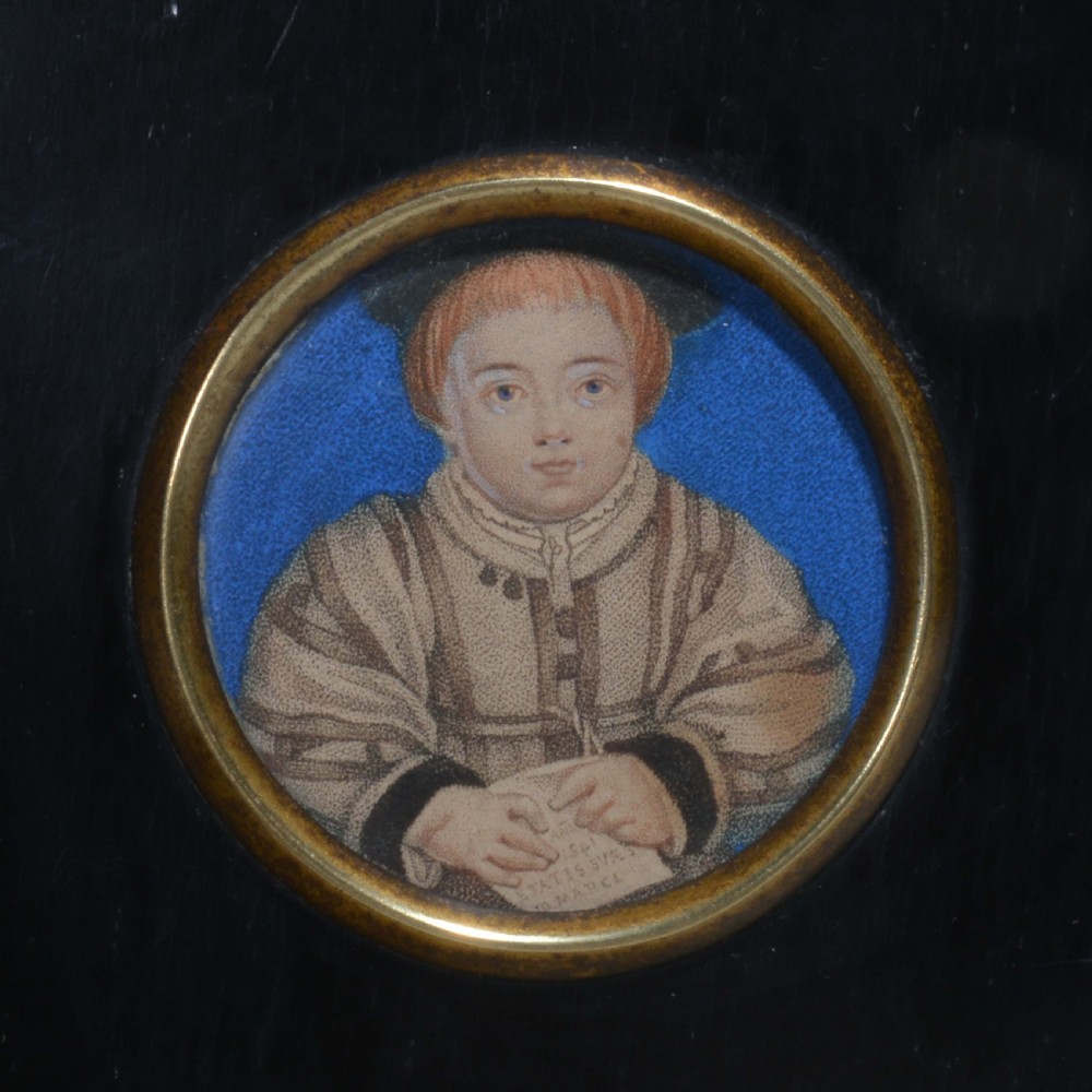 A pair of square ebonised framed portrait miniatures featuring Tudor figures in oval gilt bezels topped with brass acorn hangers. View VII
