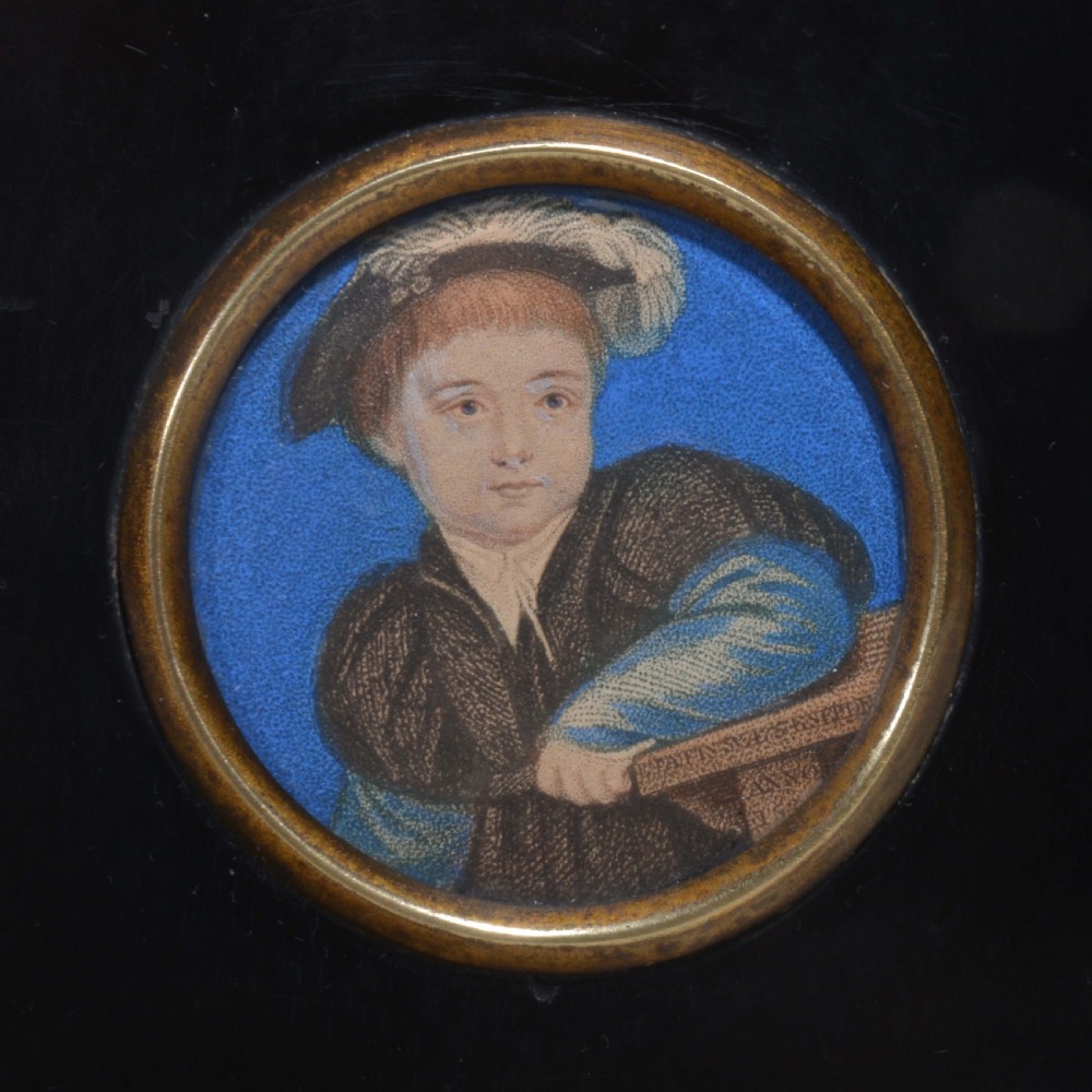 A pair of square ebonised framed portrait miniatures featuring Tudor figures in oval gilt bezels topped with brass acorn hangers. View VIII