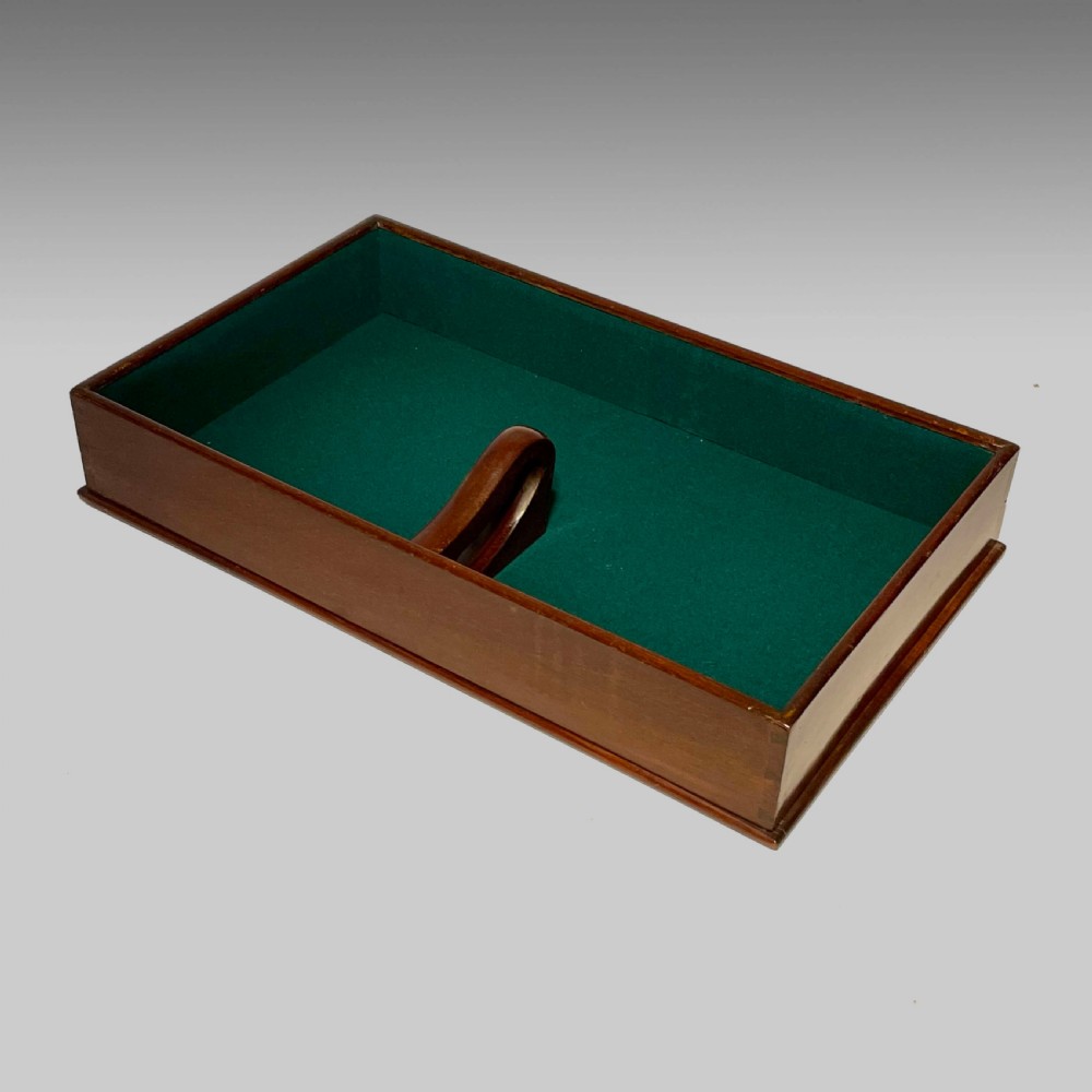 A rectangular Georgian mahogany tray lined with green baize fabric featuring a central cutout carrying handle and hand-cut dovetail joints. View III