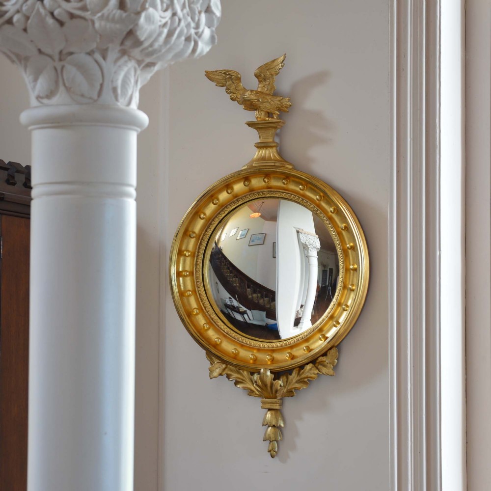 Regency convex giltwood mirror