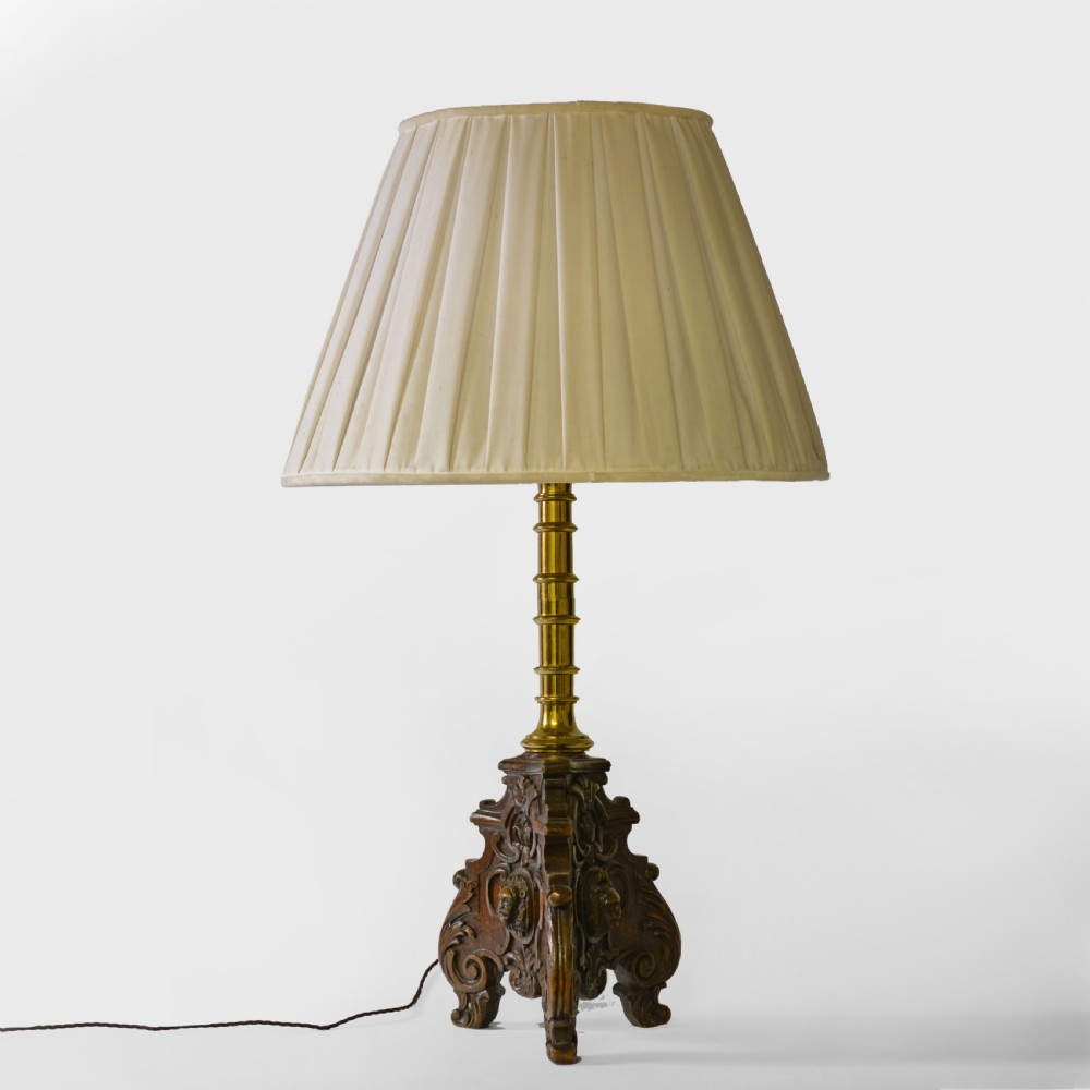 A Flemish carved oak table lamp base featuring a sculpted lion mask and a turned brass column. View IV