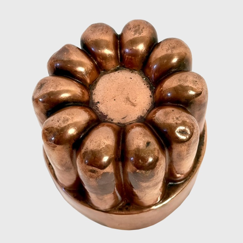 A nineteenth-century circular copper jelly mould featuring a fluted lobed upper design above a smooth cylindrical rim. View III