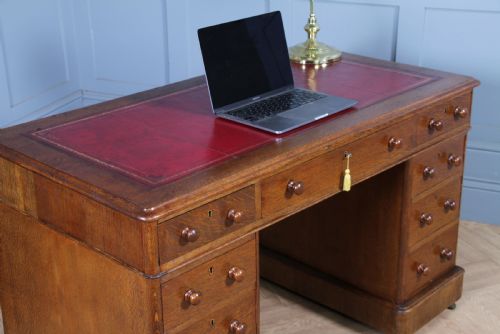 fig 1. Antique Victorian Medium Oak 9 Drawer Twin Pedestal Leather Top Writing Desk