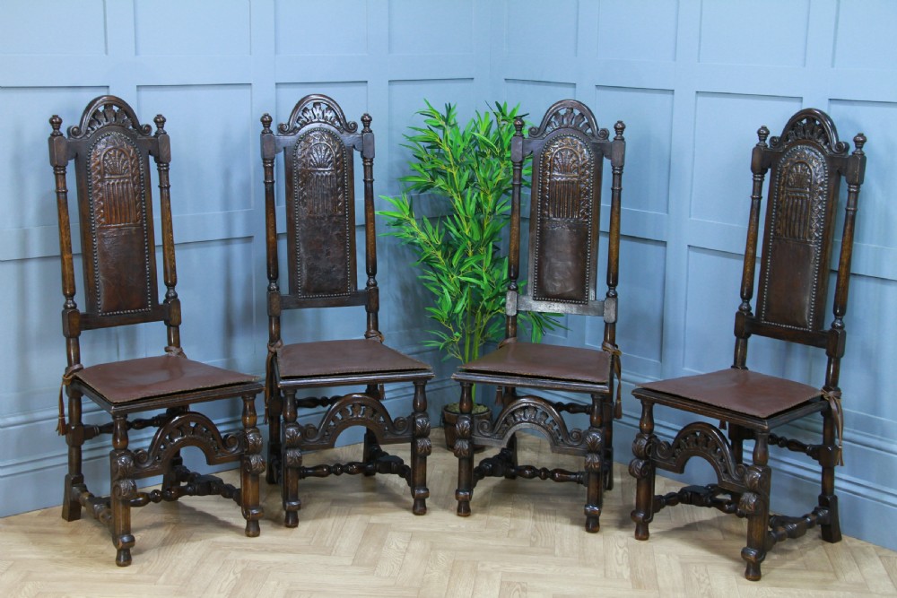 4 Antique Spanish Revival Oak Embossed Leather Cane Seat Tall Back Dining Chairs View II