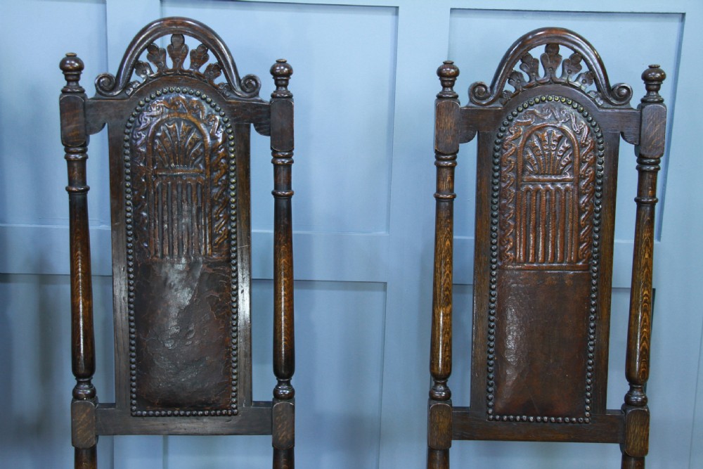 4 Antique Spanish Revival Oak Embossed Leather Cane Seat Tall Back Dining Chairs View IV