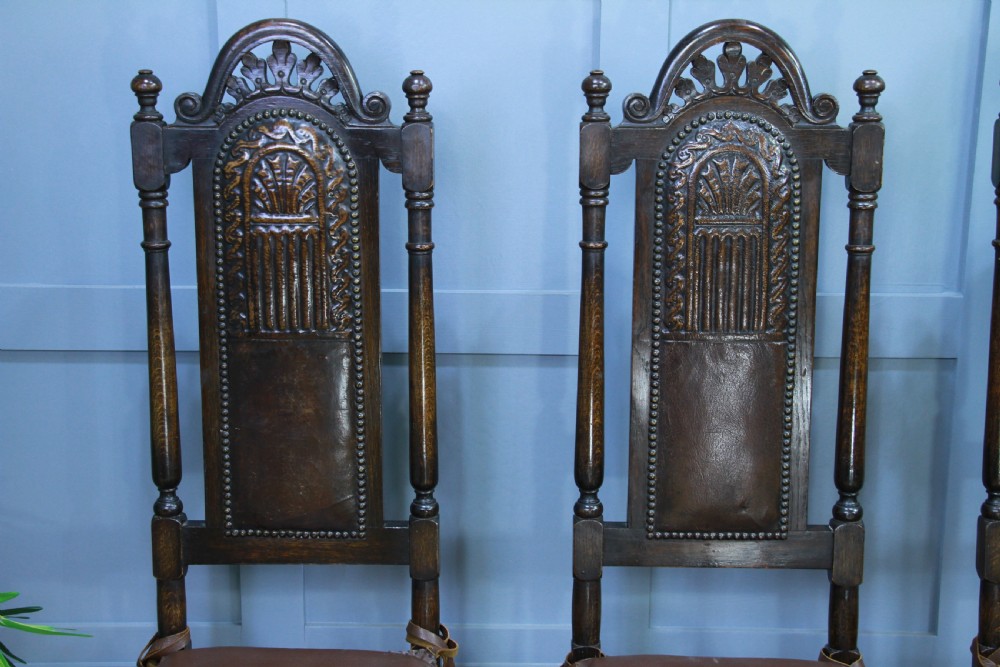 4 Antique Spanish Revival Oak Embossed Leather Cane Seat Tall Back Dining Chairs View VII