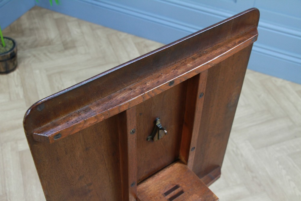 A Victorian flame mahogany tilt-top wine table with a rectangular top, spiral barley twist column, and tripod base. View XIV