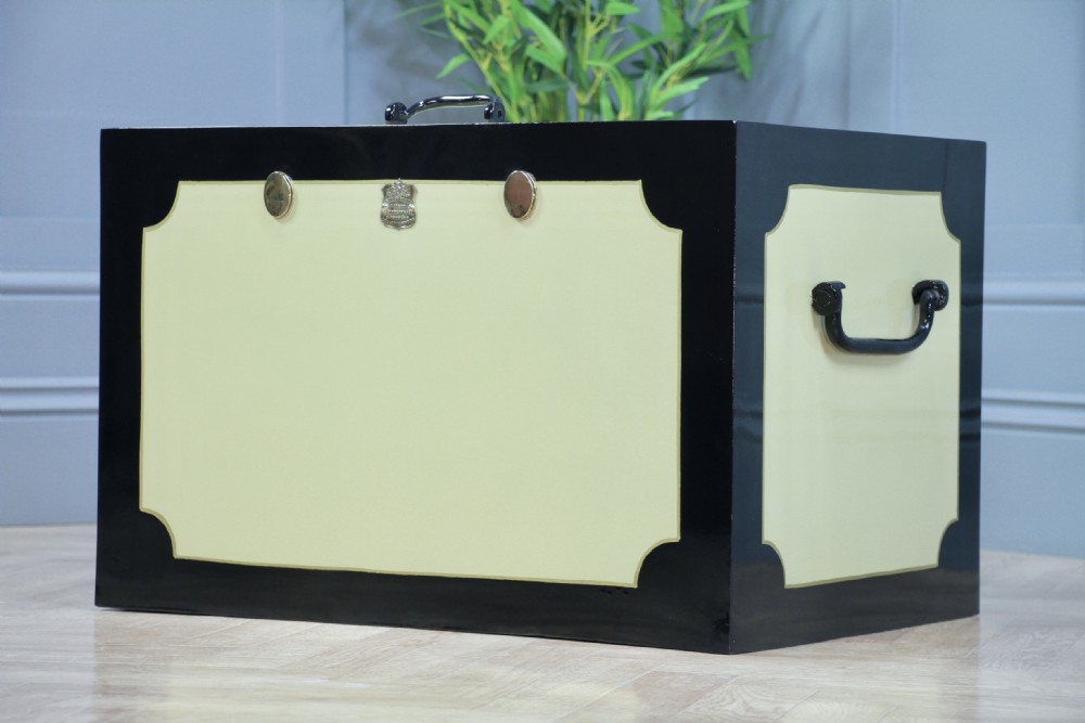 A restored Victorian George Price iron strong box with black painted edges, cream center panels, heavy iron handles, and a brass makers plaque. View XIV