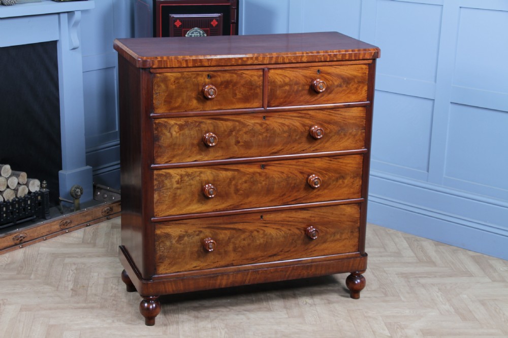 Outstanding Original Antique Victorian Flame Grain Mahogany Chest of 5 Drawers on Turned Legs