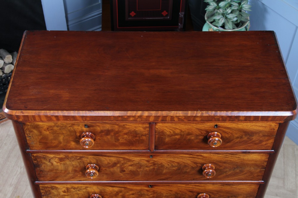Outstanding Original Antique Victorian Flame Grain Mahogany Chest of 5 Drawers on Turned Legs View XII