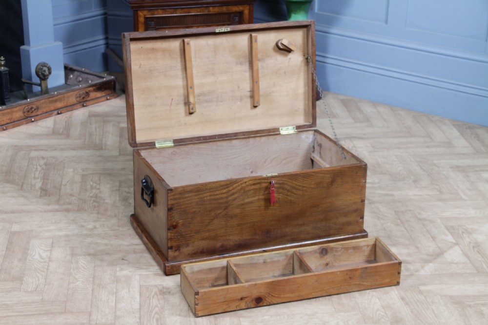 A rectangular solid elm tool chest featuring hand-cut dovetail joints, black iron side handles, and a warm wood grain finish. View XX