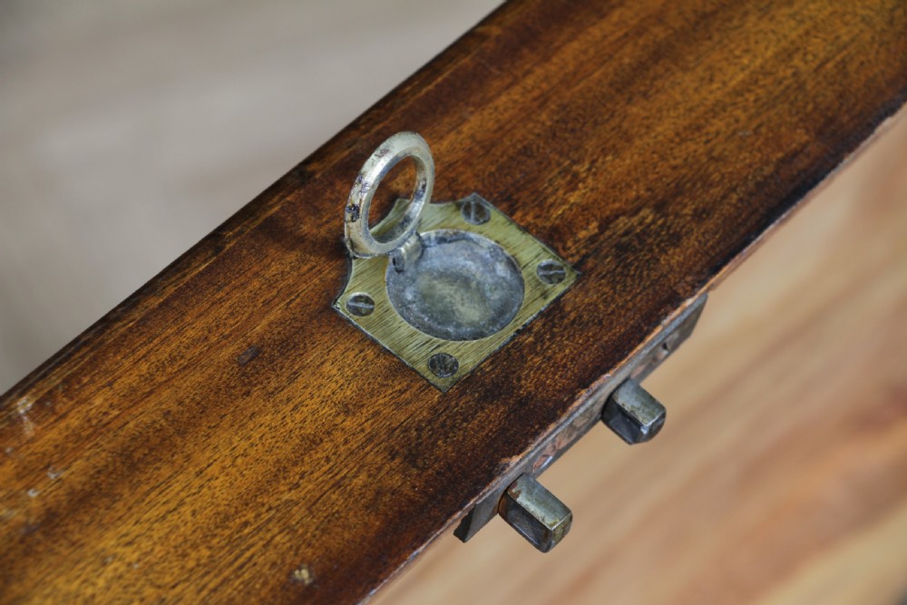 A rectangular Victorian camphor wood military campaign trunk featuring brass corner straps, side handles, and a central brass keyhole. View XIII