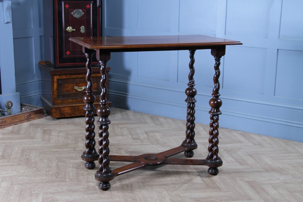 Victorian dark rosewood hall table featuring four triple barley twist legs connected by a central X-frame stretcher. View II