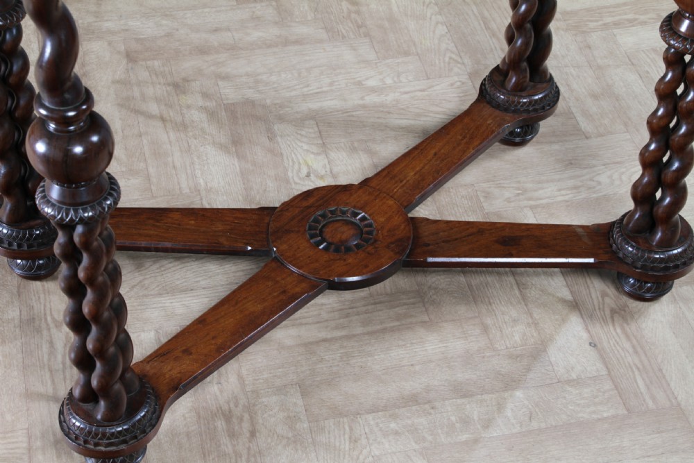 Victorian dark rosewood hall table featuring four triple barley twist legs connected by a central X-frame stretcher. View IV