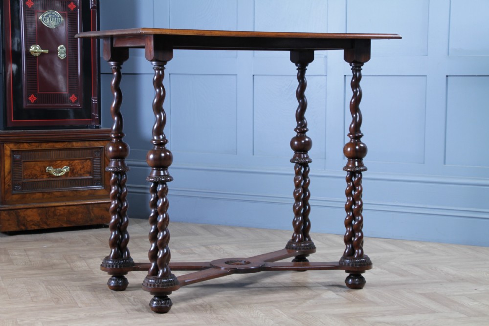 Victorian dark rosewood hall table featuring four triple barley twist legs connected by a central X-frame stretcher. View V