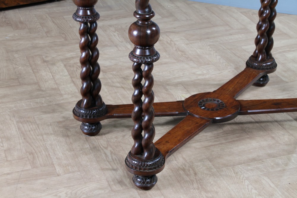 Victorian dark rosewood hall table featuring four triple barley twist legs connected by a central X-frame stretcher. View VII