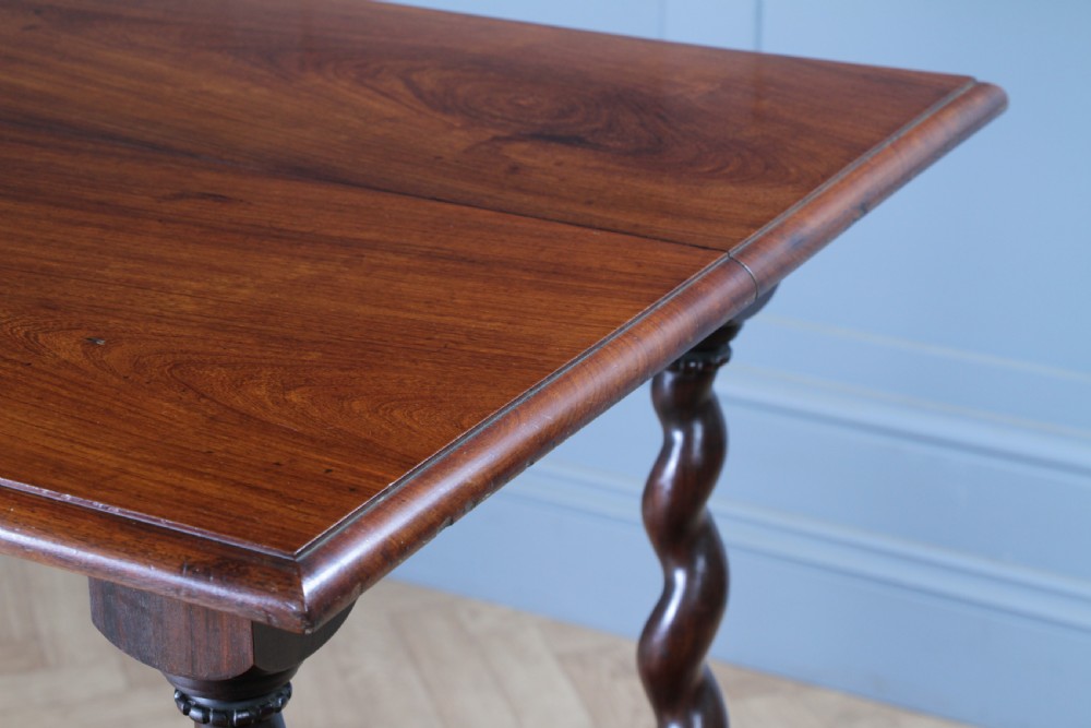 Victorian dark rosewood hall table featuring four triple barley twist legs connected by a central X-frame stretcher. View XI
