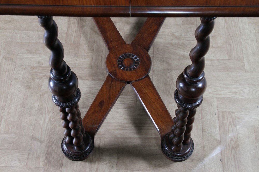Victorian dark rosewood hall table featuring four triple barley twist legs connected by a central X-frame stretcher. View XVI