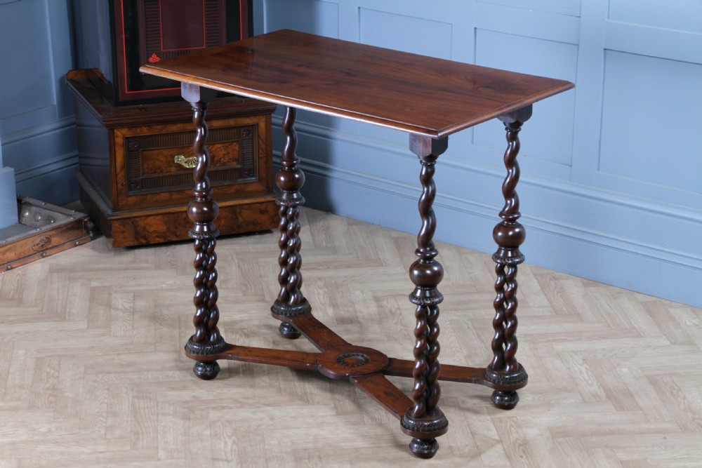 Victorian dark rosewood hall table featuring four triple barley twist legs connected by a central X-frame stretcher. View XVIII