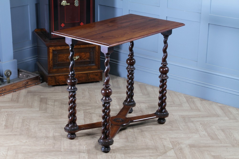 Victorian dark rosewood hall table featuring four triple barley twist legs connected by a central X-frame stretcher. View XIX