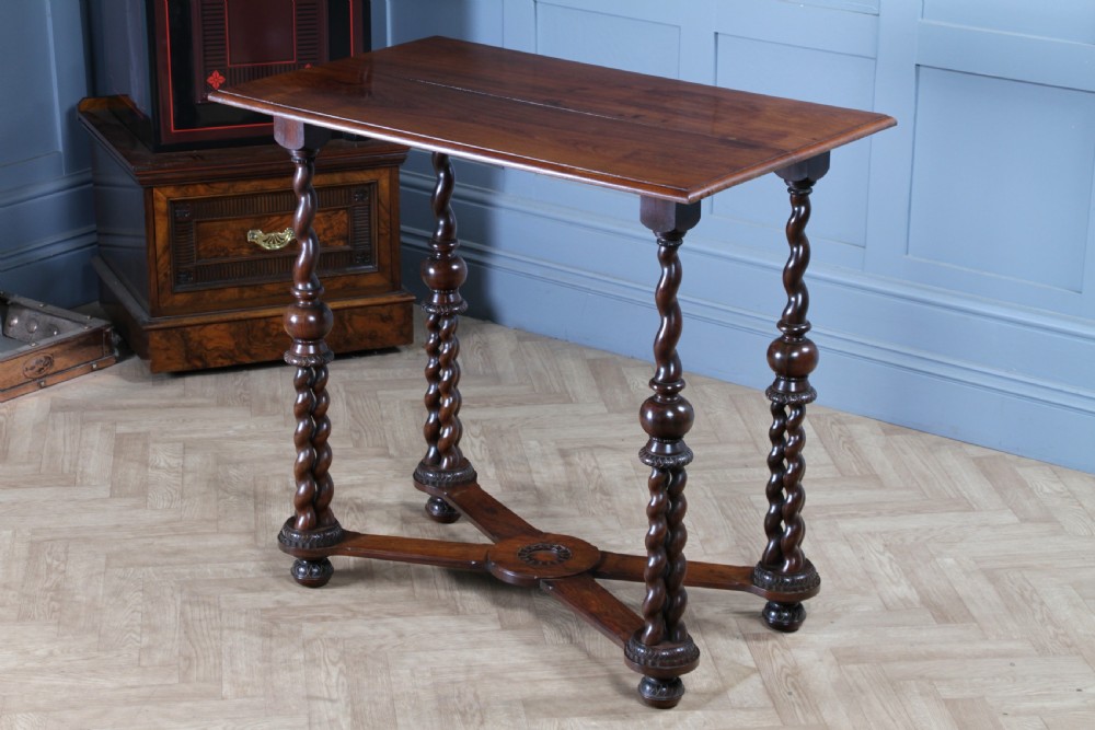 Victorian dark rosewood hall table featuring four triple barley twist legs connected by a central X-frame stretcher. View XX