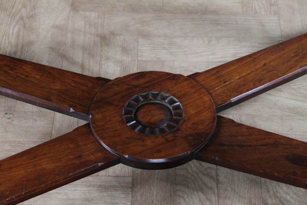Victorian dark rosewood hall table featuring four triple barley twist legs connected by a central X-frame stretcher. View XXIV