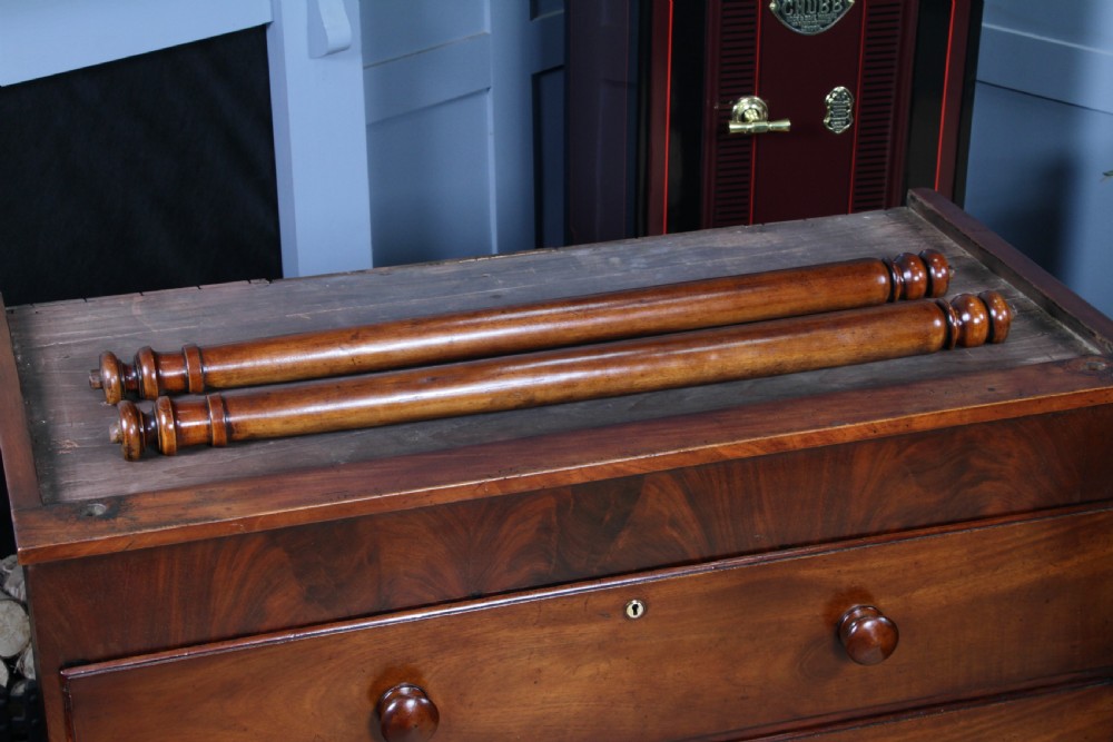 A Georgian Scottish mahogany chest on chest featuring eight drawers with turned wooden knobs, fluted side columns, and an overhanging pediment cornice. View XVIII