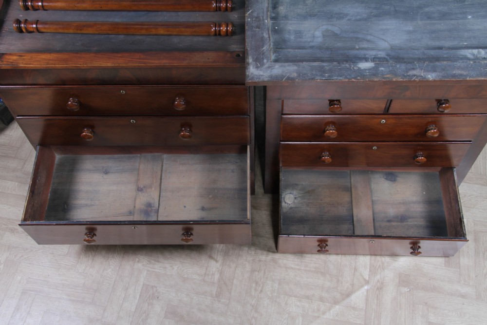 A Georgian Scottish mahogany chest on chest featuring eight drawers with turned wooden knobs, fluted side columns, and an overhanging pediment cornice. View XXII