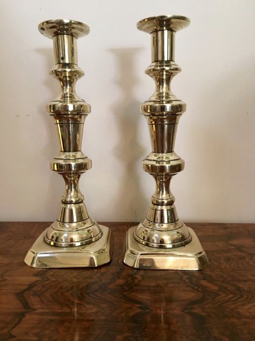 Pair of Tall Antique Brass Candlesticks