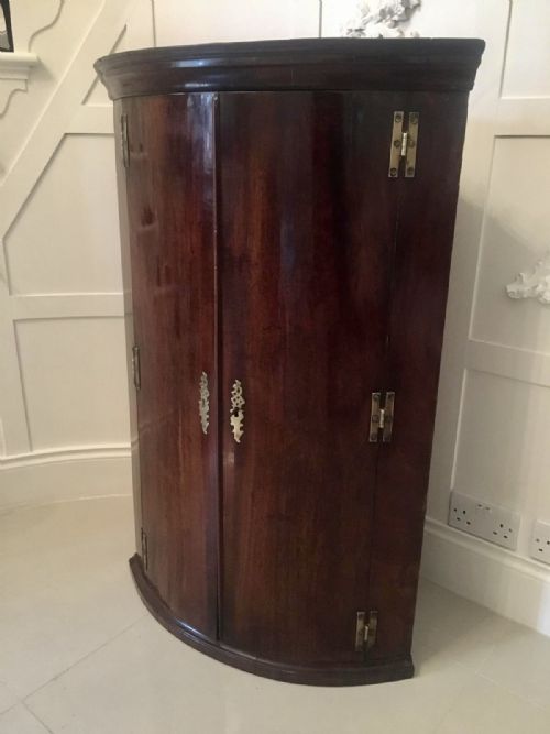 GEORGE III MAHOGANY HANGING BOW FRONT CORNER CABINET - ADDITIONAL PHOTO 1