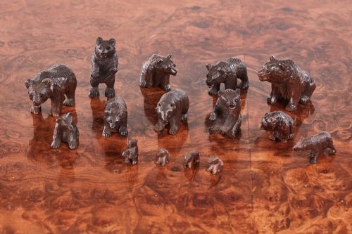 Fifteen Antique Miniature Carved Black Forest Bears 
