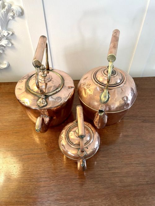 ANTIQUE COLLECTION OF THREE COPPER KETTLES - ADDITIONAL PHOTO 1