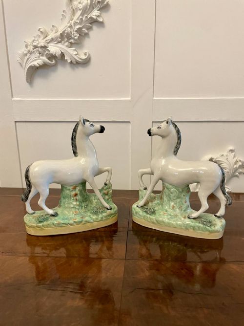 Unusual Pair of Antique Victorian Staffordshire White Horses 
