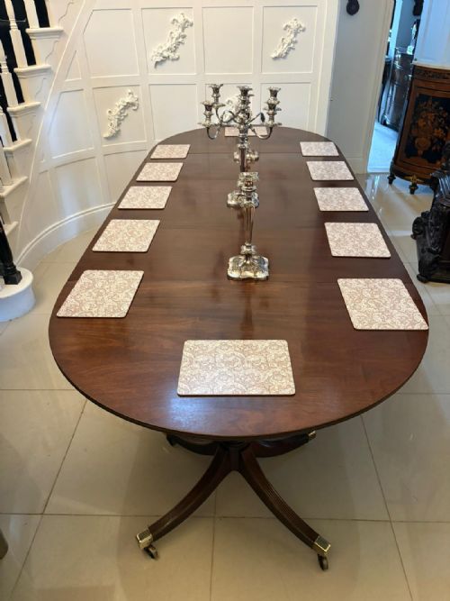 ANTIQUE GEORGIAN MAHOGANY TRIPLE PILLAR DINING TABLE 1214 SEATER EXTENDING WITH TWO LEAVES - ADDITIONAL PHOTO 2