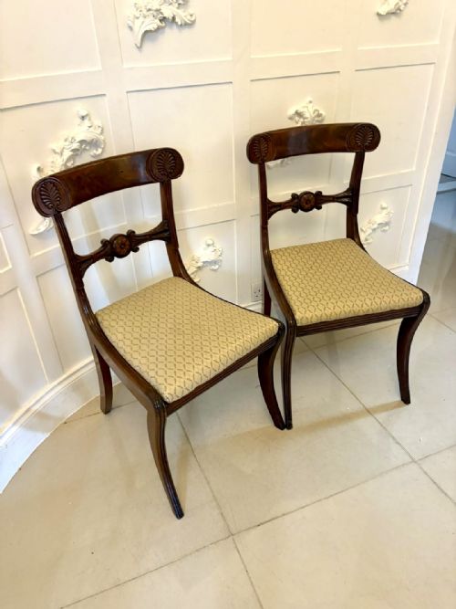 PAIR OF ANTIQUE REGENCY CARVED FIGURED MAHOGANY SIDE CHAIRS