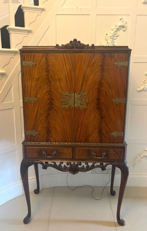 ANTIQUE FIGURED MAHOGANY ILLUMINATED COCKTAIL DRINKS CABINET ON STAND