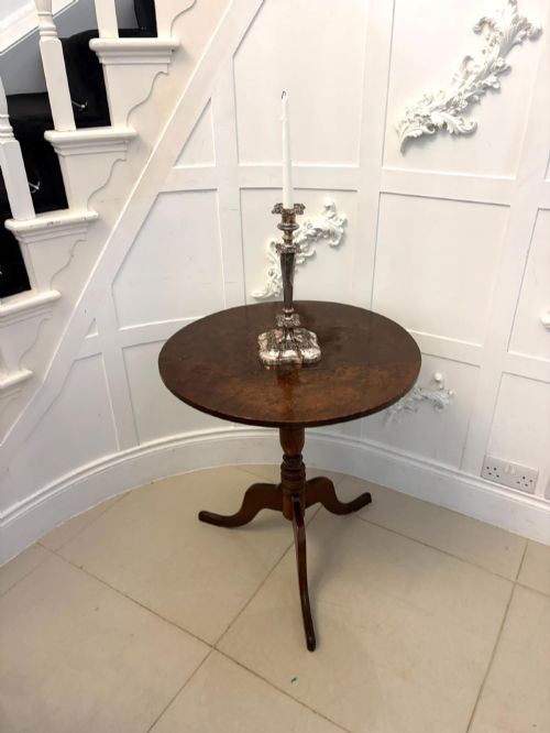 fig 4. An 18th-century Georgian burr oak tilt-top occasional table featuring a circular surface, turned pedestal column, and tripod base shown upright.