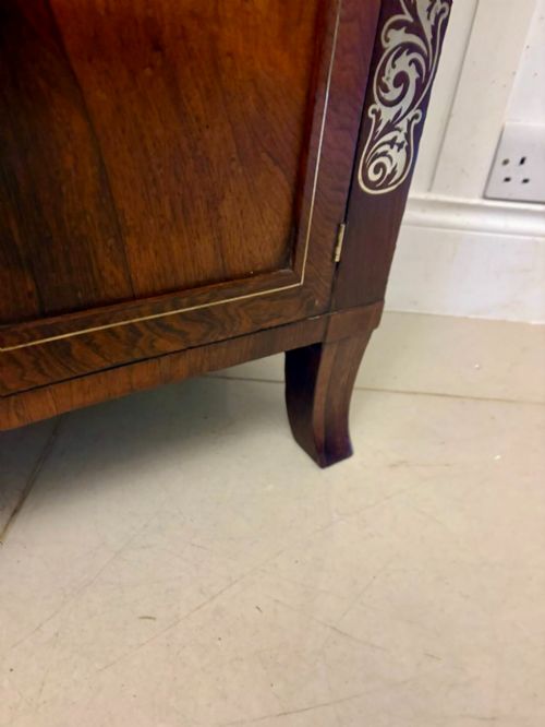 fig 1. An antique Regency mahogany chiffonier side cabinet featuring intricate floral brass inlay on the doors and frieze with an upper open shelf.